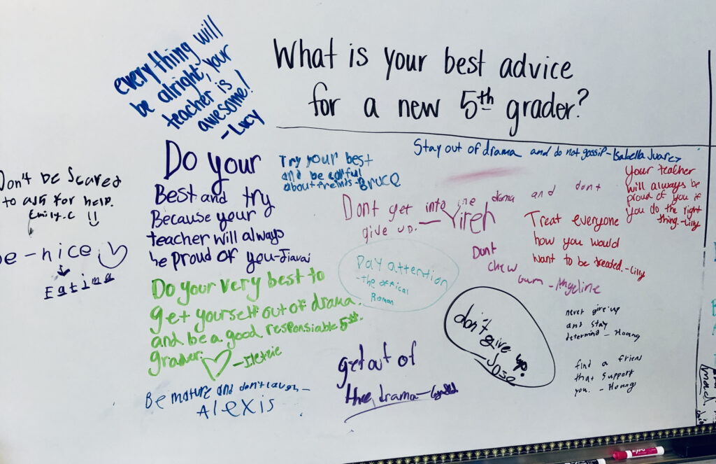 A photo of a white board with student answers to the question, "What is your best advice for a new 5th grader?"
